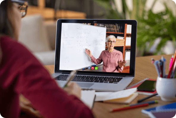 Person looking a teacher doing a course in videoconference